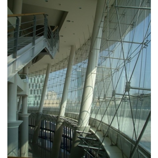 高雄市巨蛋綜合體育館新建工程-鋁浪板牆 、玻璃帷幕 、  鋁格柵 、 結構玻璃 、防颱百葉,新格金屬股份有限公司